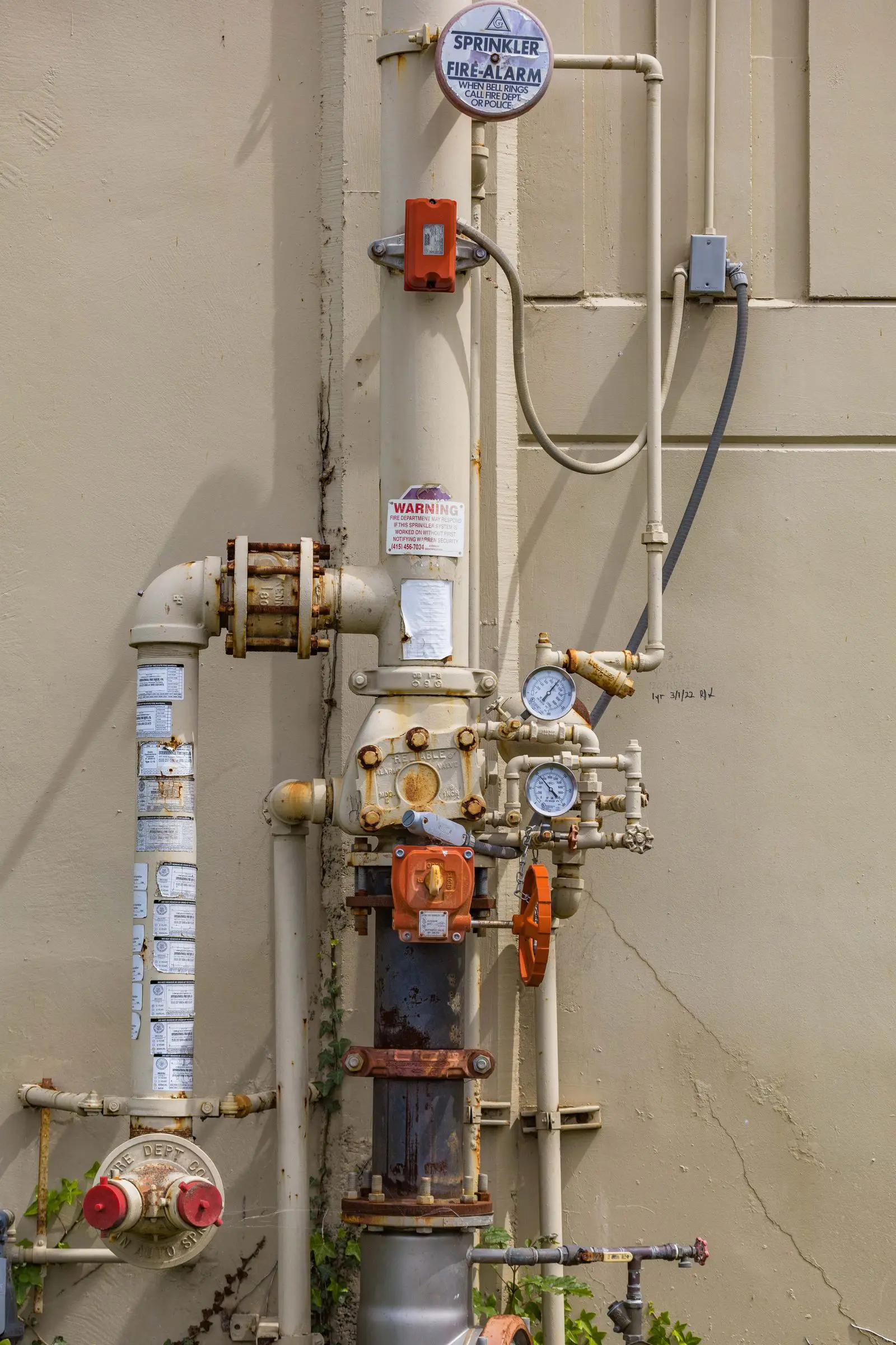 Industrial fire suppression system with pressure gauges and piping